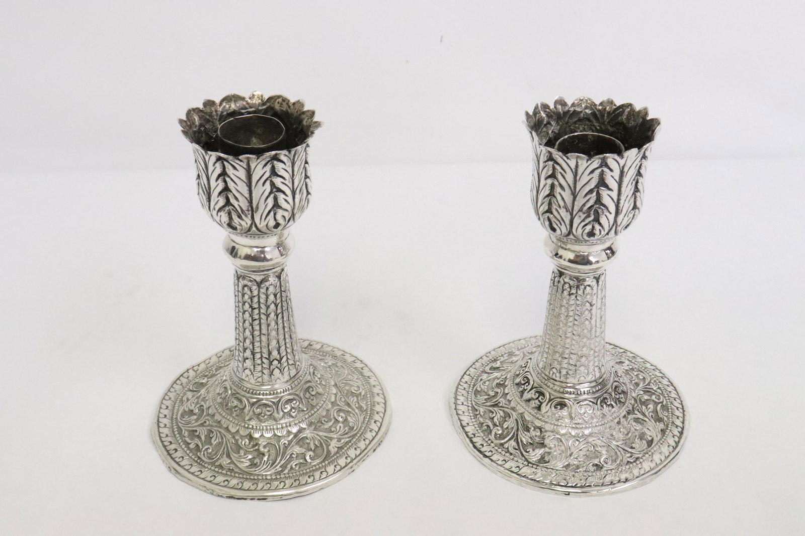 Pair antique weighted silver candle holders: Pair beautiful antique weighted silver candle holders, wt. 377.9gm, chips on base weighted fillings, 4.8"x3.5"dia