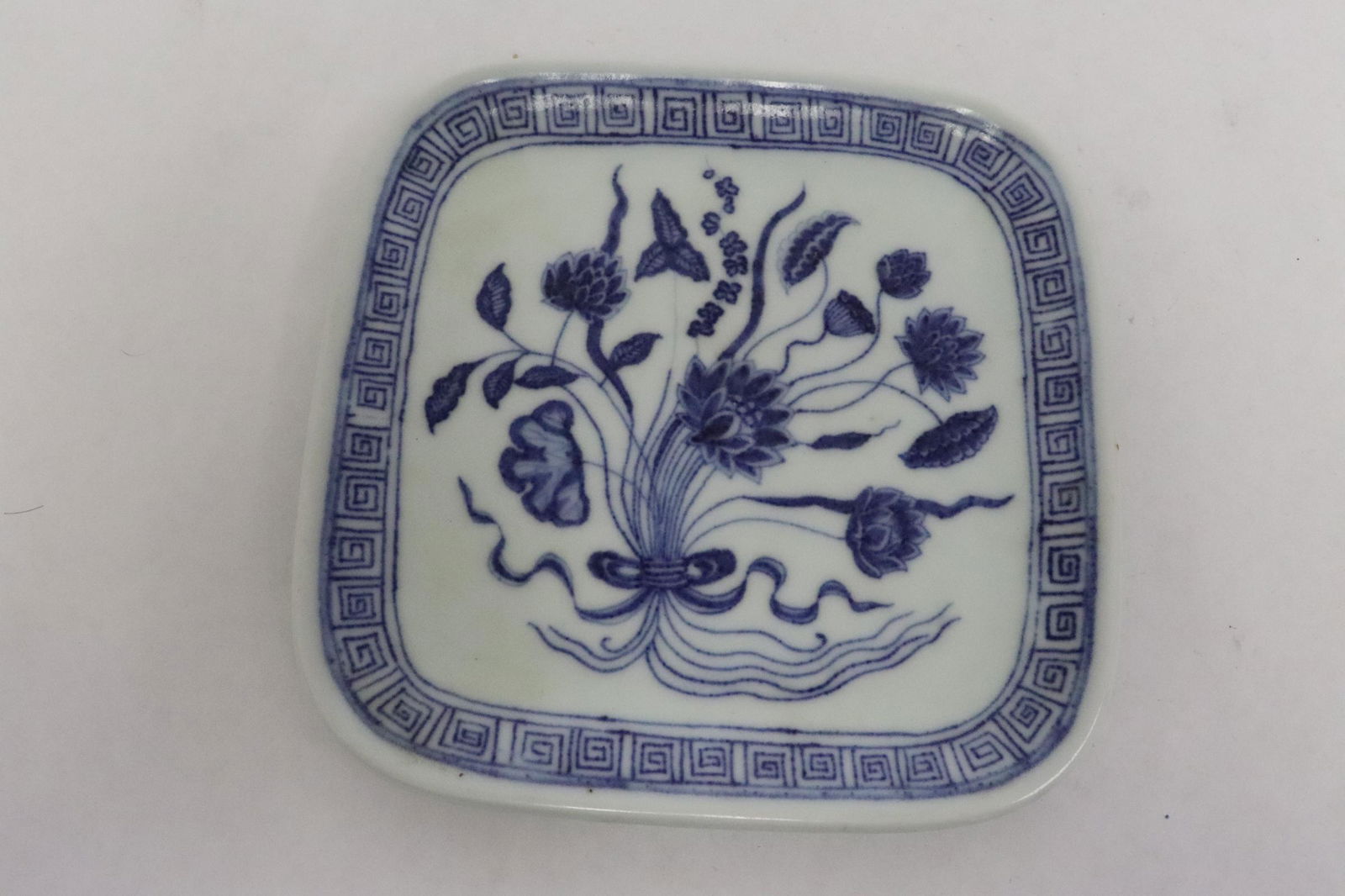 A blue and white square plate (1 of 9)