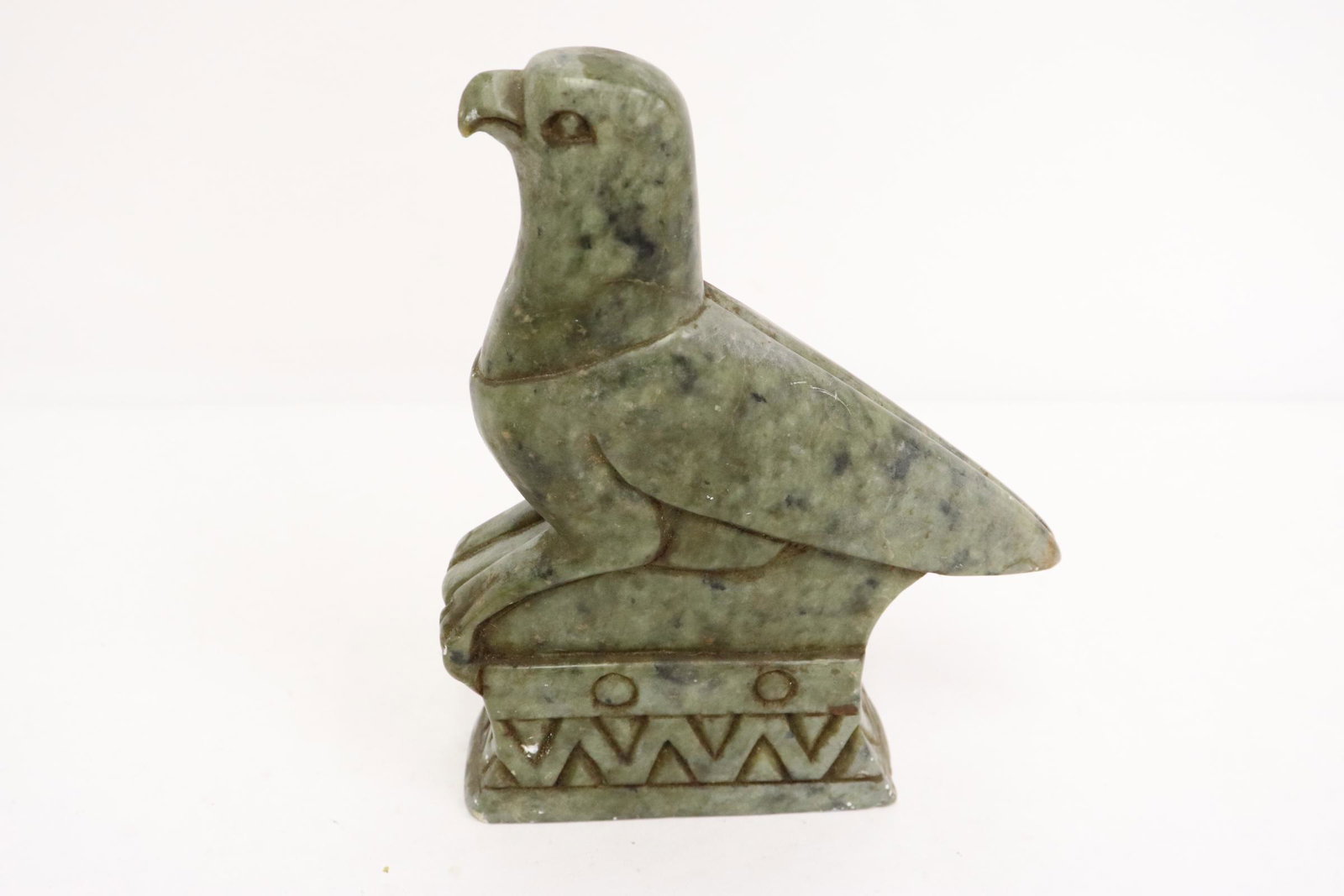 A jade like stone carved bird (1 of 9)