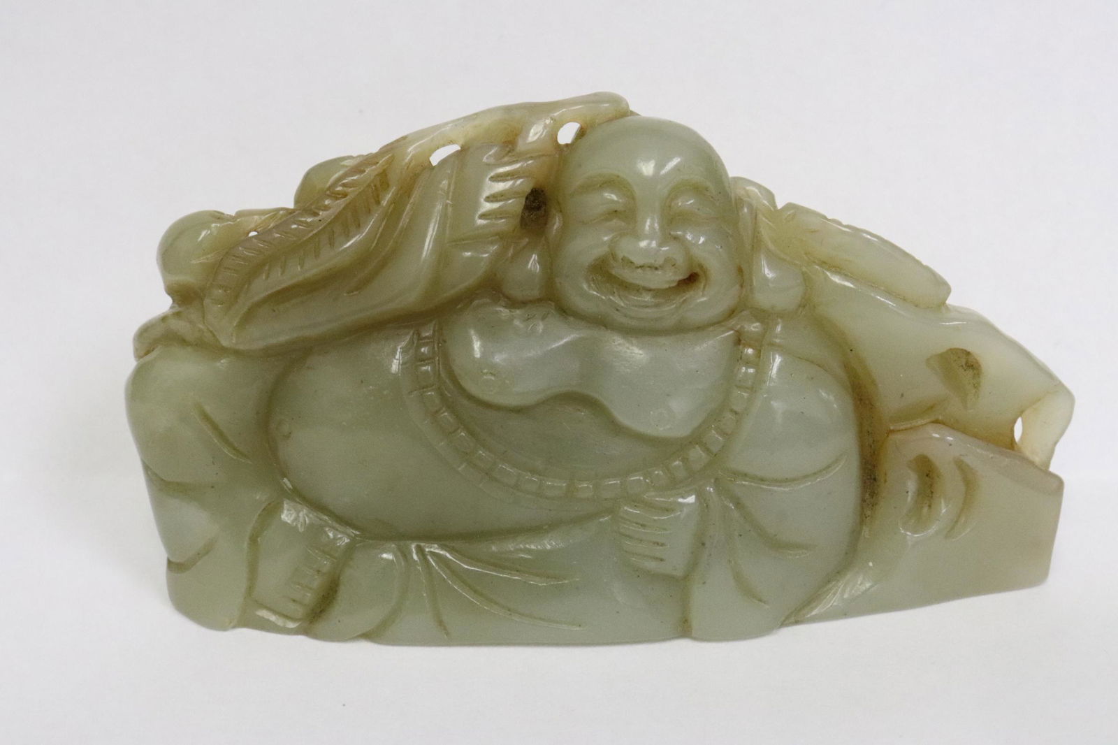 Celadon jade carved deity: Celadon jade carved deity, 2"H