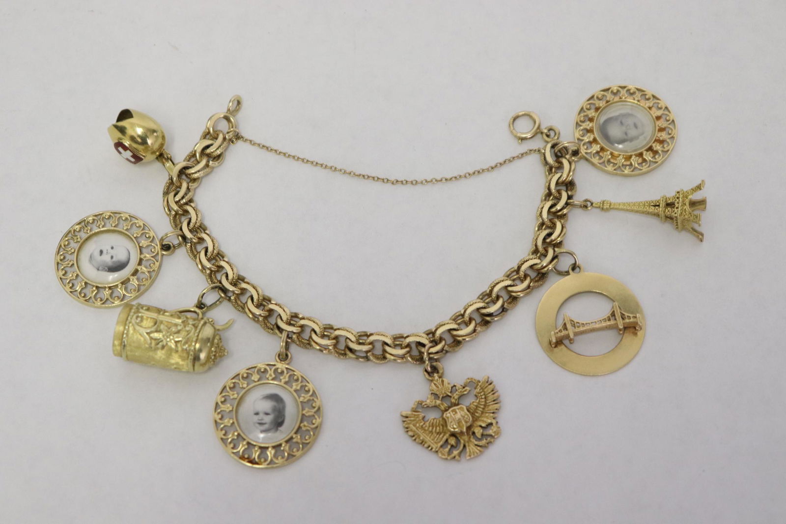 Fine 14K Y/G charm bracelet (1 of 13)