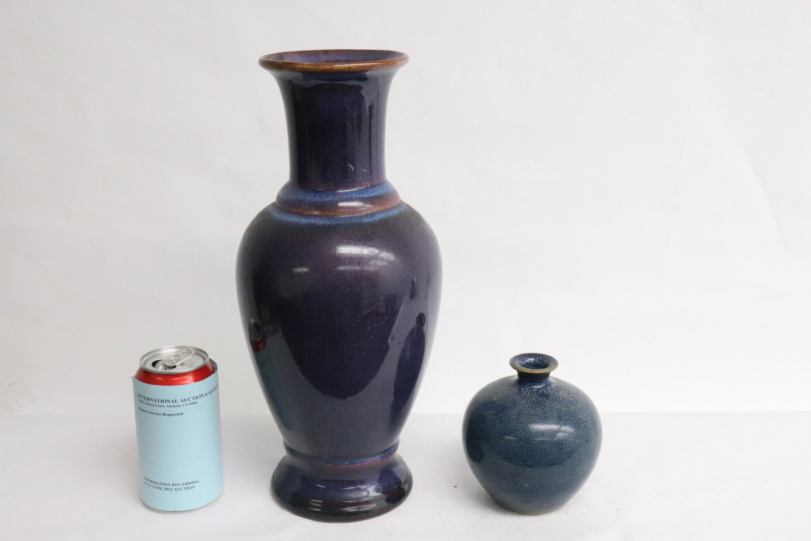 A blue jar, and a purple glazed vase (1 of 9)