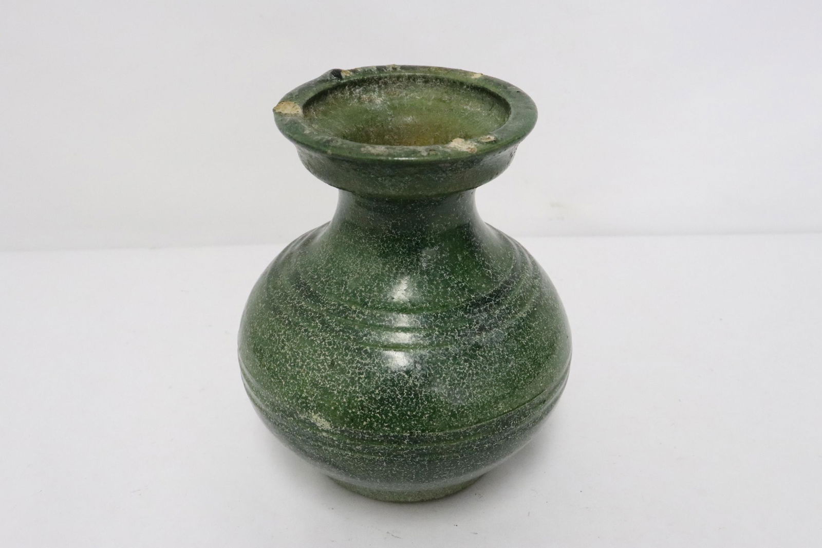 A Han green glazed earthenware jar (1 of 10)