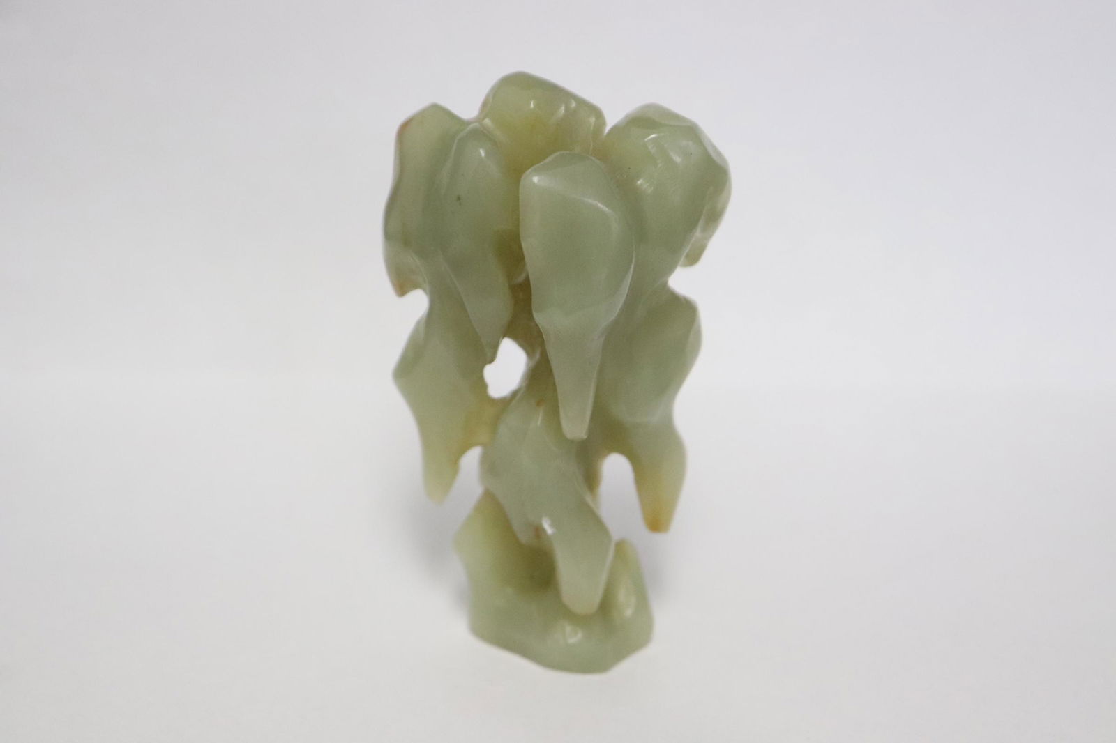 A celadon jade carved desk ornament (1 of 8)