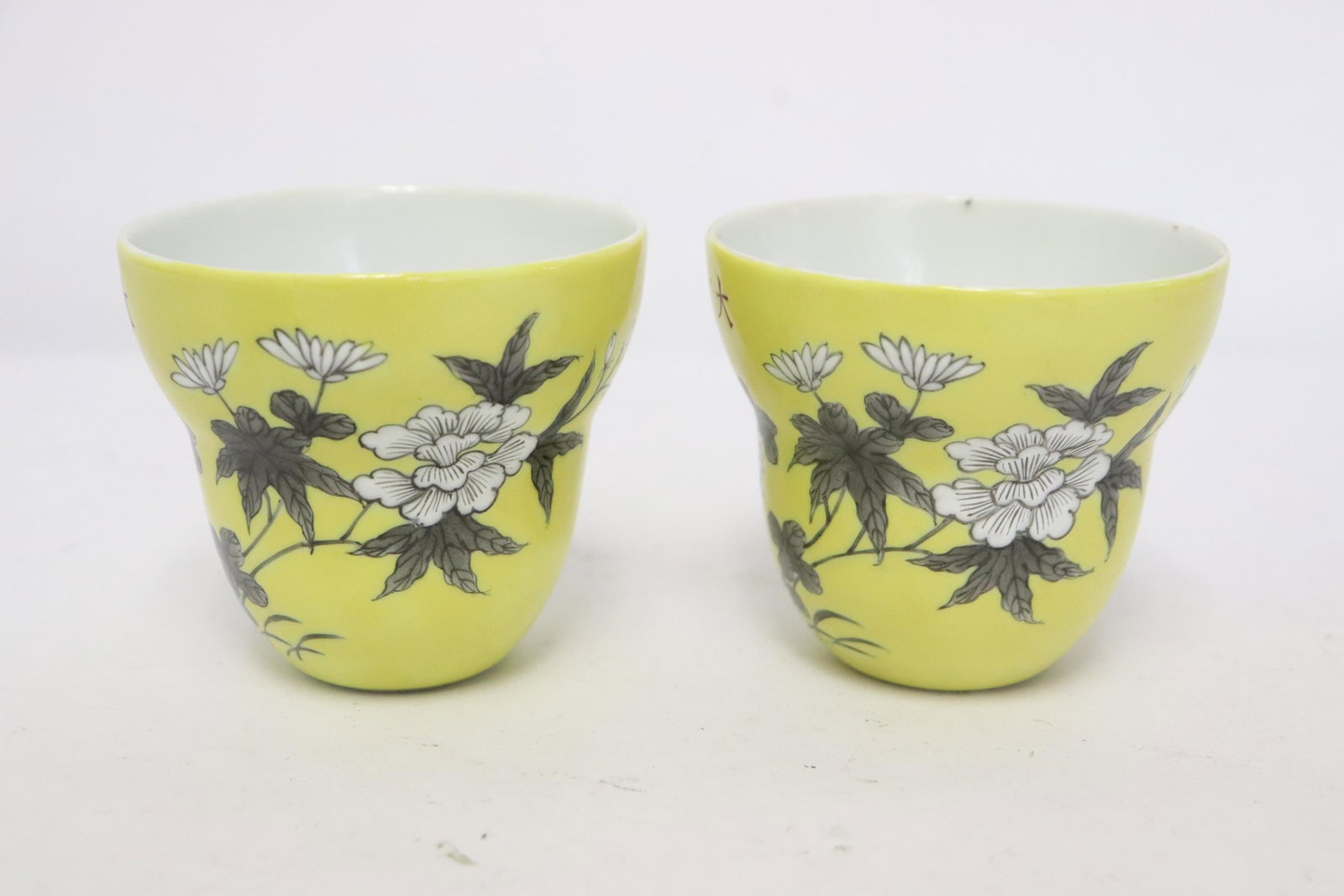 2 Chinese yellow background famille rose tea cups (1 of 10)