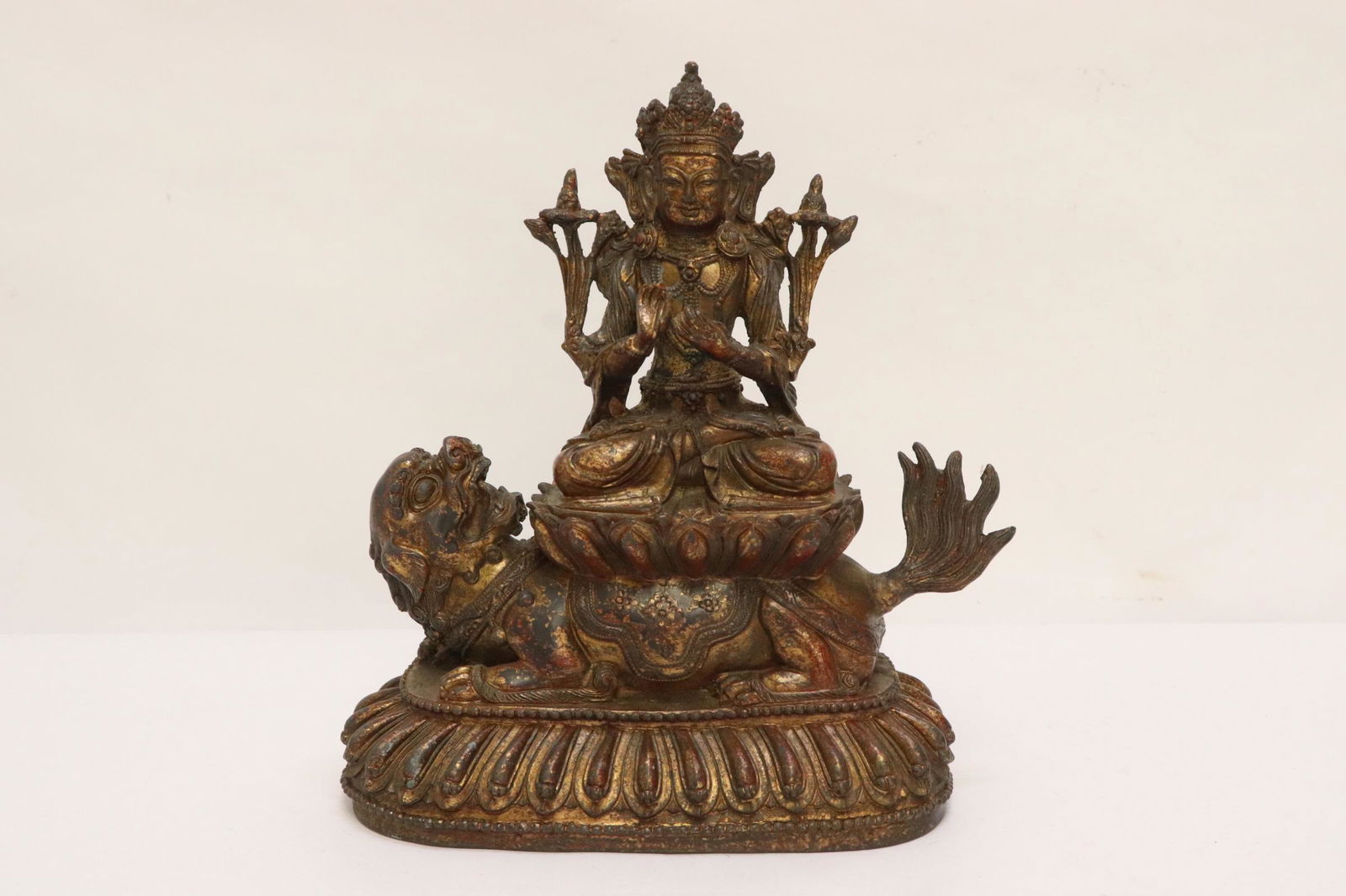 Chinese bronze sculpture of deity riding on qilin (1 of 10)