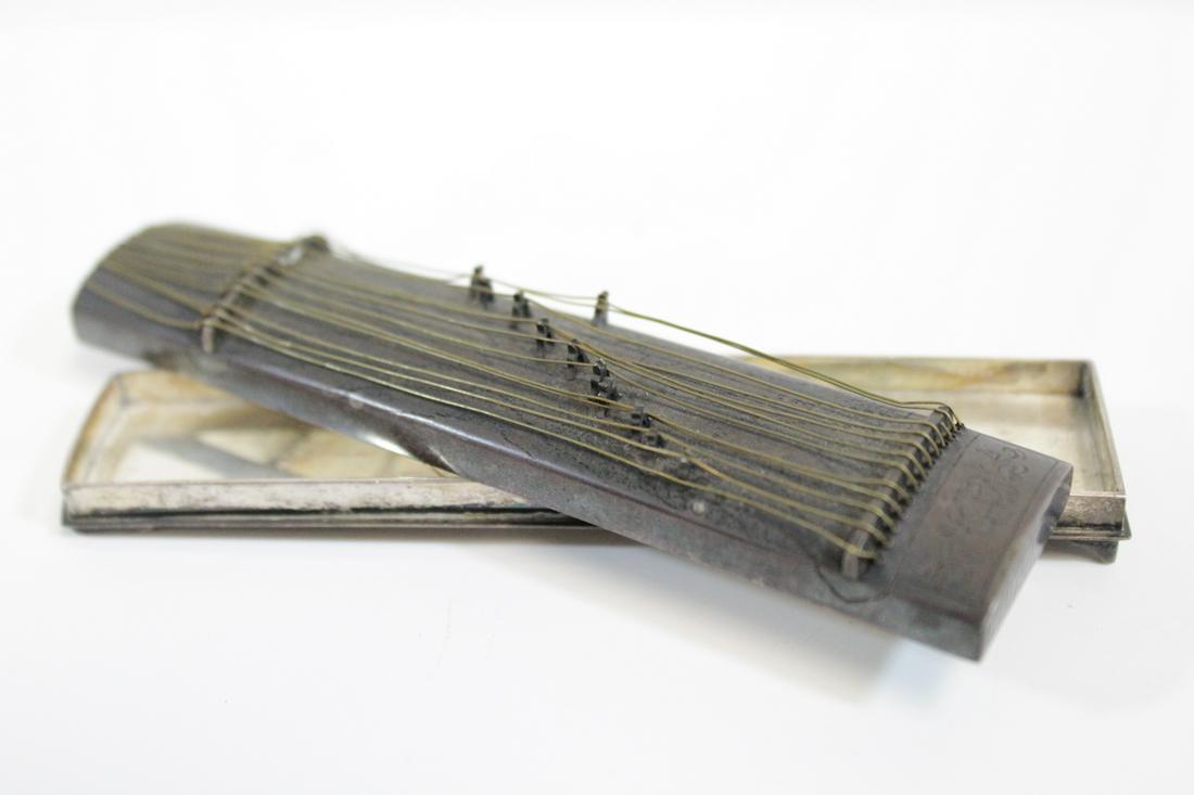 Interesting Chinese silver box: Interesting Chinese silver box in the form of music instrument, wt. 38gm, 0.6"Hx4"x0.85"