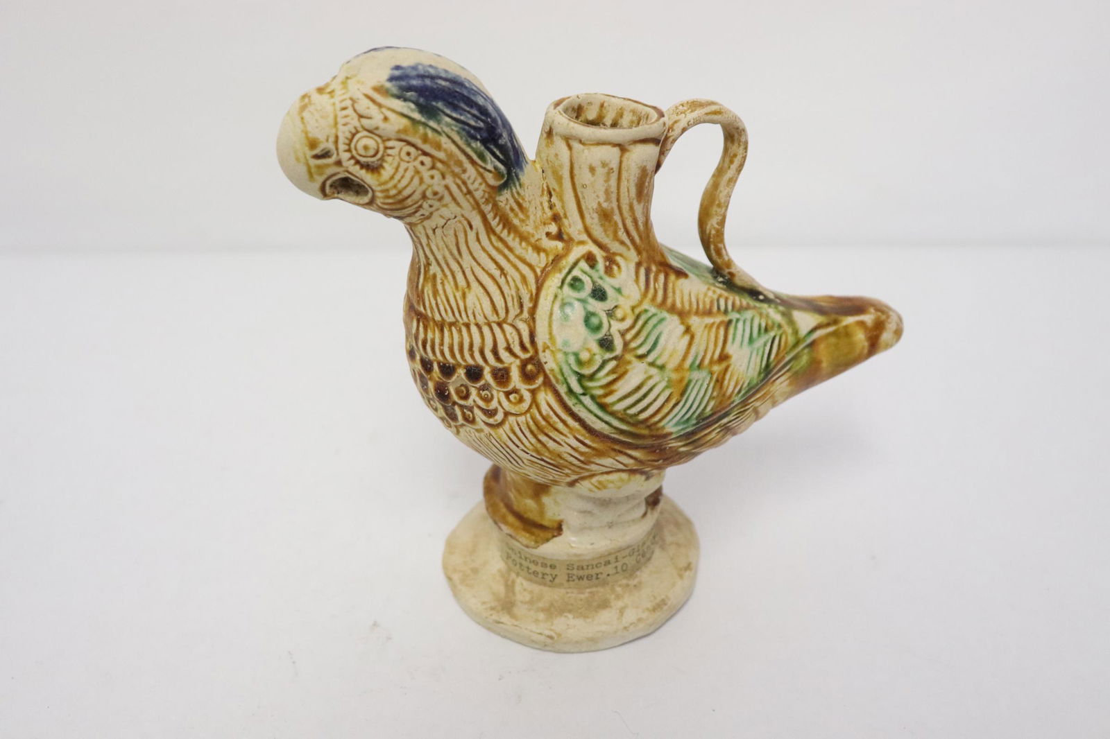 A sancai earthenware oil jar in the form of bird: A sancai earthenware oil jar in the form of bird, 6.7"H