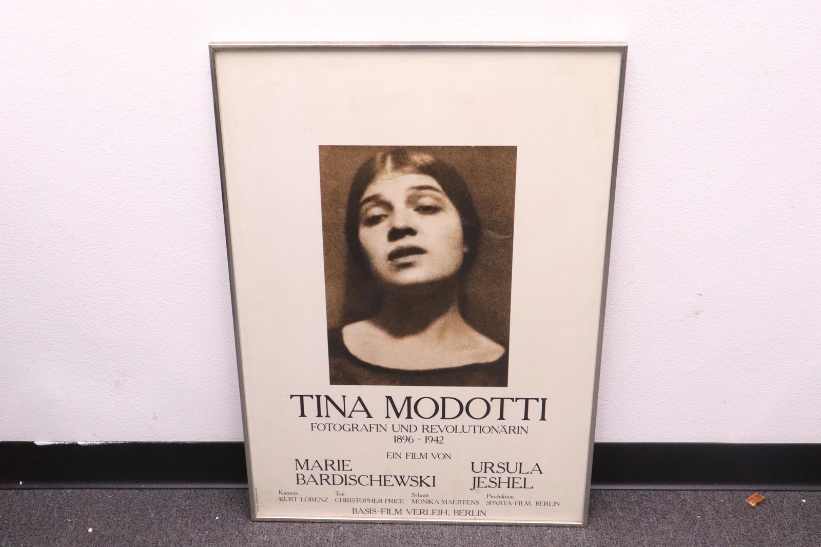 A framed poster of Tina Modotti, c1942: A framed poster of Tina Modotti, c1942, 32.5"x22.4"