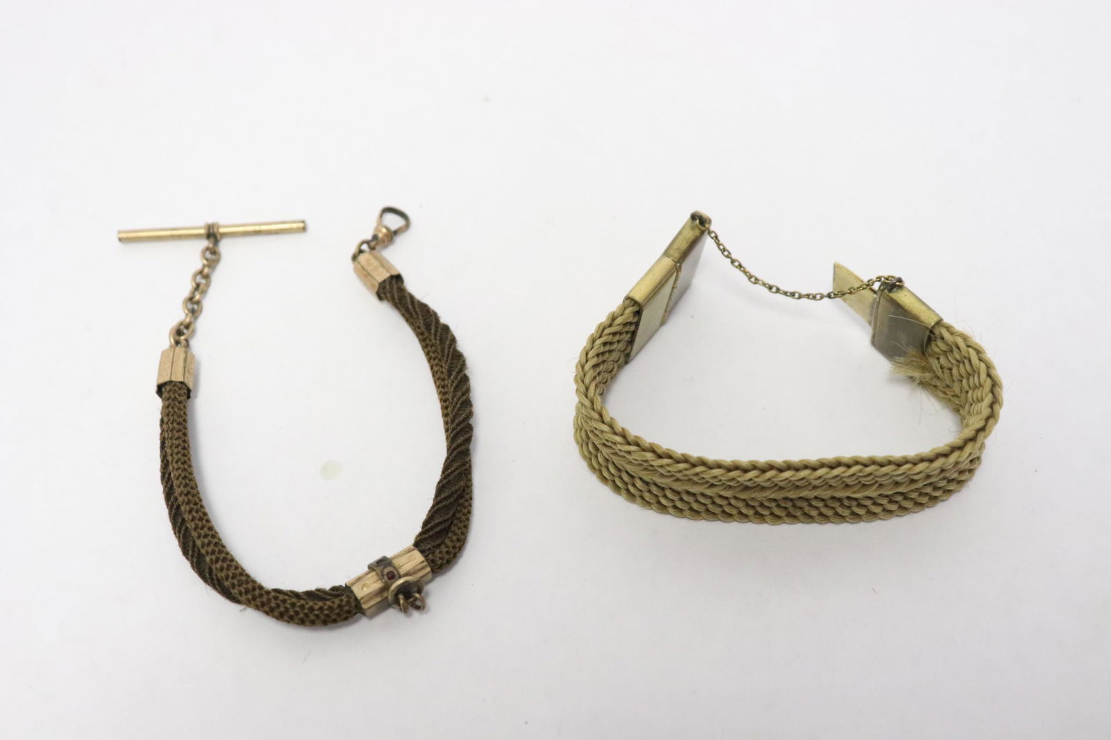 2 gold filled hair mourning pieces: 2 pieces; gold filled hair mourning watch fob (8.9"L), and a gold filled hair mourning bracelet (need restoration, 6.5"L)