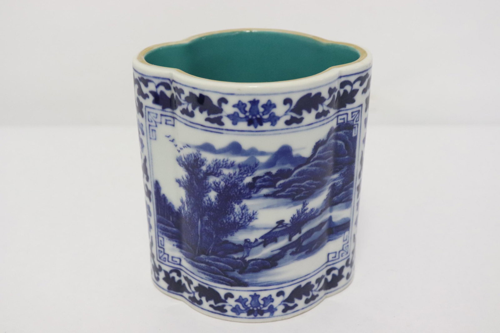 A blue and white porcelain brush holder: A blue and white porcelain brush holder, 4.2"x3.8"x3.1"
