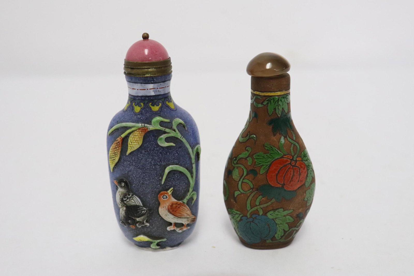 2 Chinese overlay snuff bottles: 2 Chinese overlay snuff bottles, 3.1"x1.4"x0.8", 3.4"x1.4"x0.85"