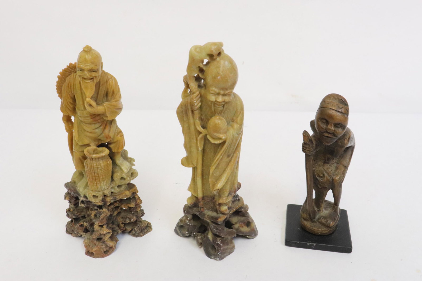 3 soapstone carvings: 3 soapstone carvings, 4.7"H - 6.2"H