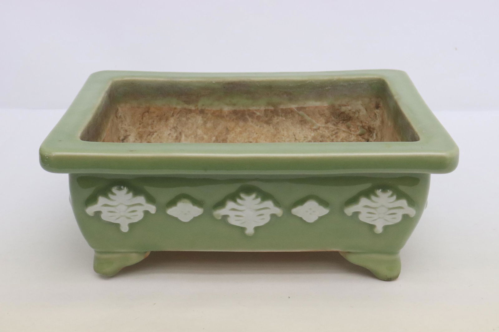 White on celadon porcelain planter: White on celadon porcelain planter, 5.3"x13.2"x9.7"