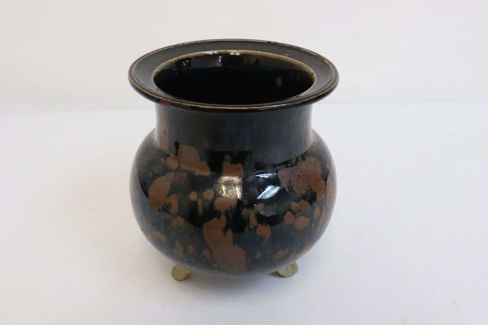 A brown on brown earthenware jar: A brown on brown earthenware jar, 5.05"x4.8"dia