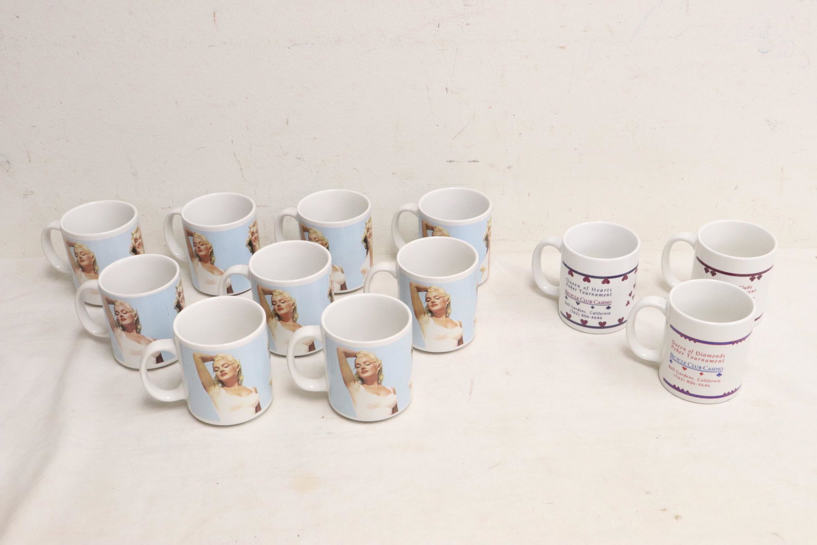 Lot of porcelain cups: Lot of porcelain cups (3.9"x4.8"x3.3"); including Marilyn Monroe motif examples