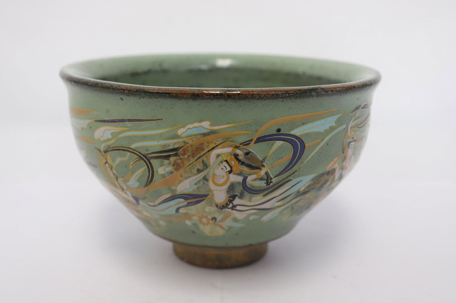 A Song style earthenware bowl painted with deities (1 of 9)