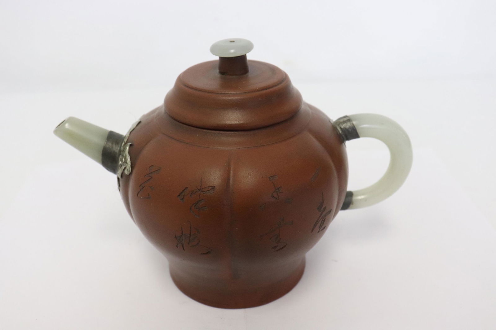 Fine Yixing teapot with jade spout and handle (1 of 9)