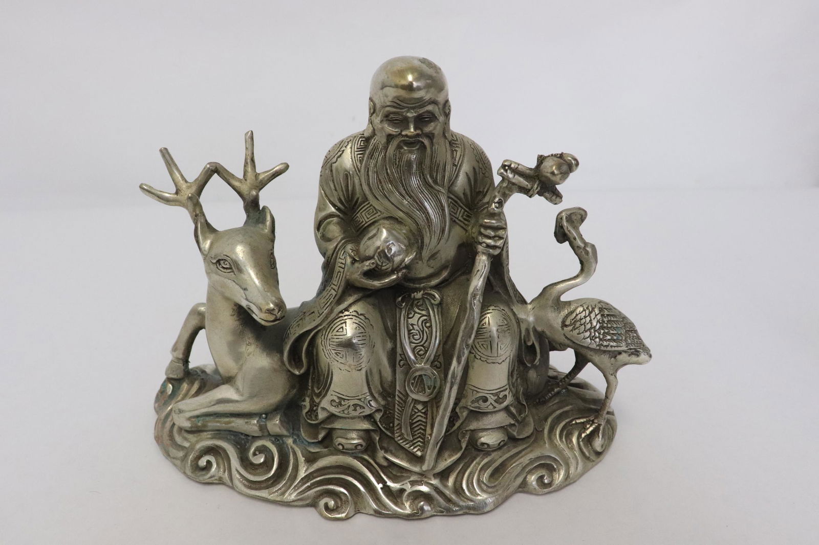 Fine Chinese white bronze sculpture of deity with deer (1 of 10)