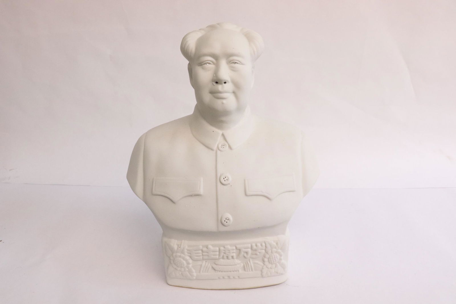 An earthenware sculpture of Mao's portrait: An earthenware sculpture of Mao's portrait, 11.4"H