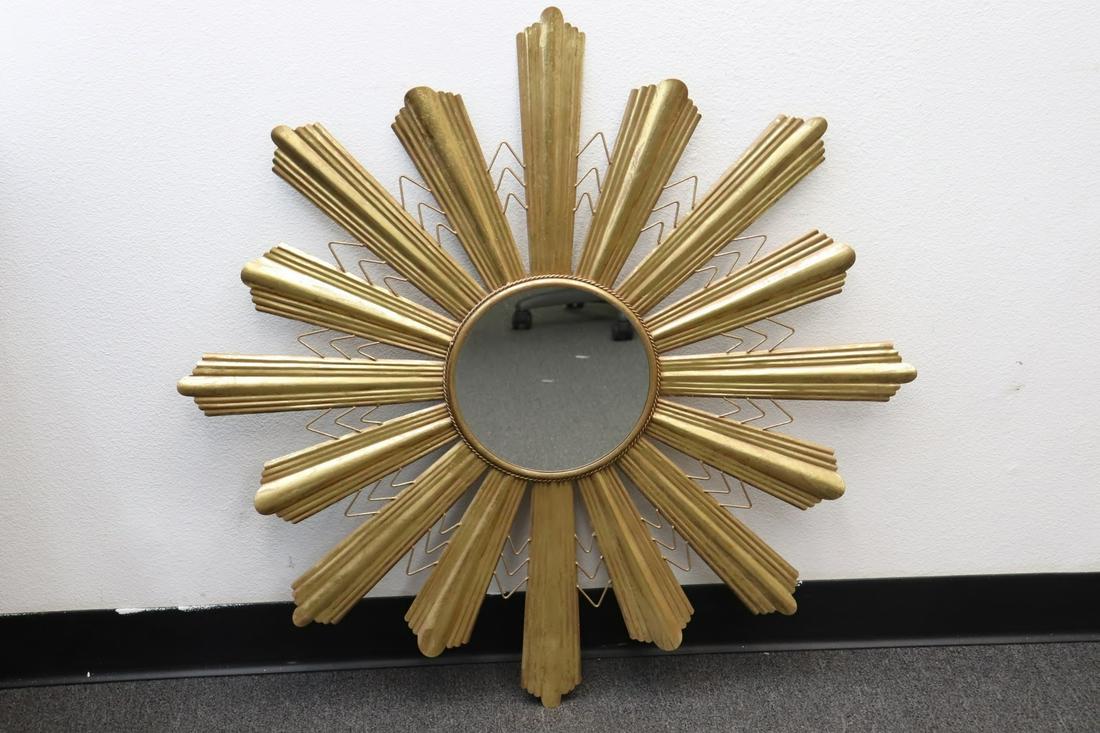 A brass framed wall mirror (1 of 6)