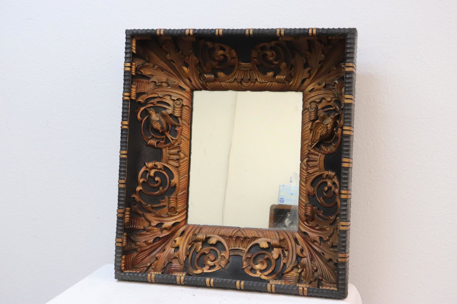 Wall mirror with very ornate frame: Wall mirror with very ornate frame, 12.2"x10.1"
