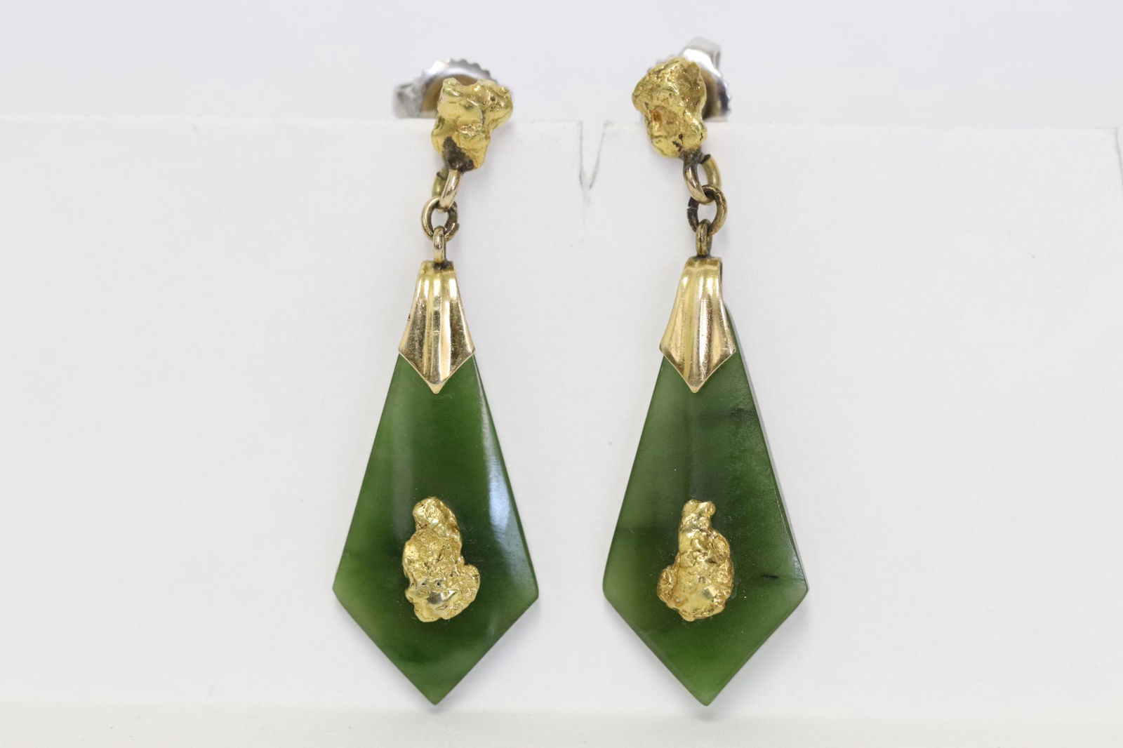 Pair Chinese 14K Y/G jadeite earrings w/ gold nugget: Pair Chinese 14K Y/G jadeite earrings with natural gold nugget, jadeite measures approx. 25x12.5mm, wt. 4.6gm