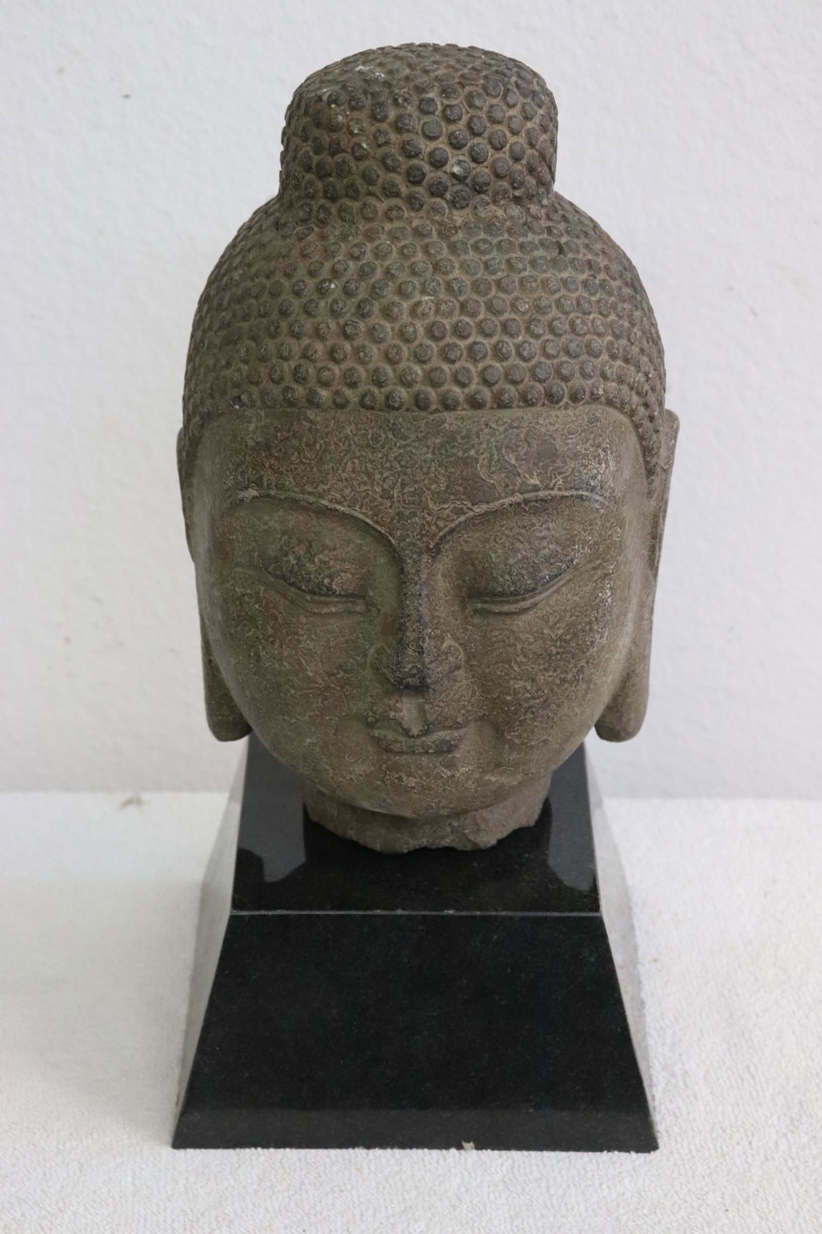 A Chinese stone Buddha head on stand (1 of 9)