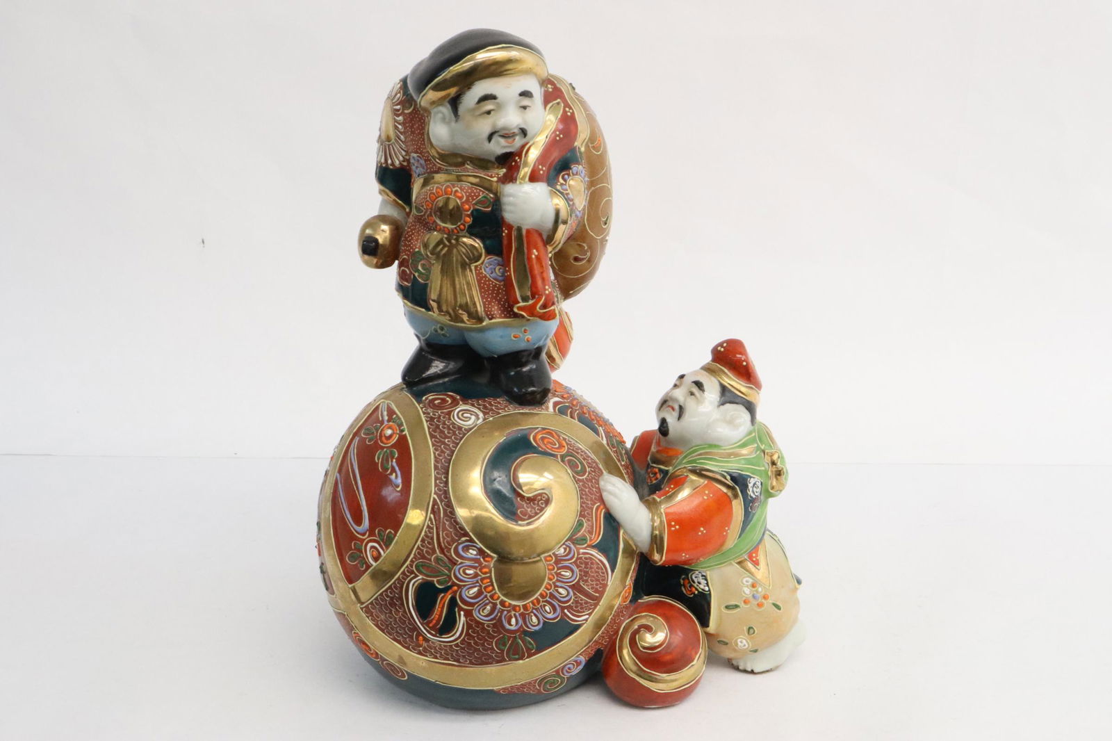 Vintage Japanese satsuma earthenware figure: Vintage Japanese satsuma earthenware figure, 9.5"H