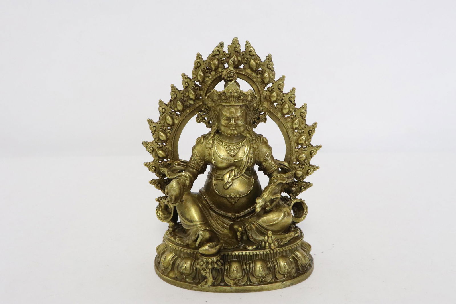 A small bronze sculpture of deity (1 of 8)