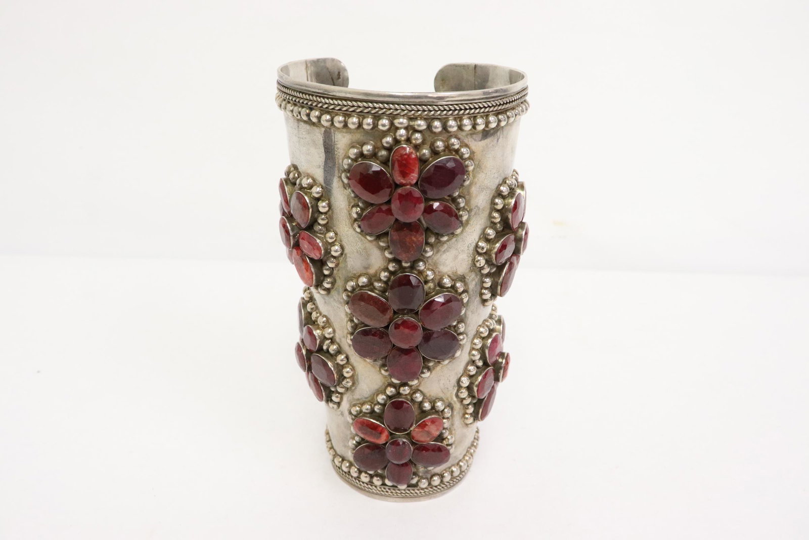Very unusual sterling cuff with rubies: Very unusual sterling cuff with rubies, total ruby over 400ct, 6.75"x3.5"dia