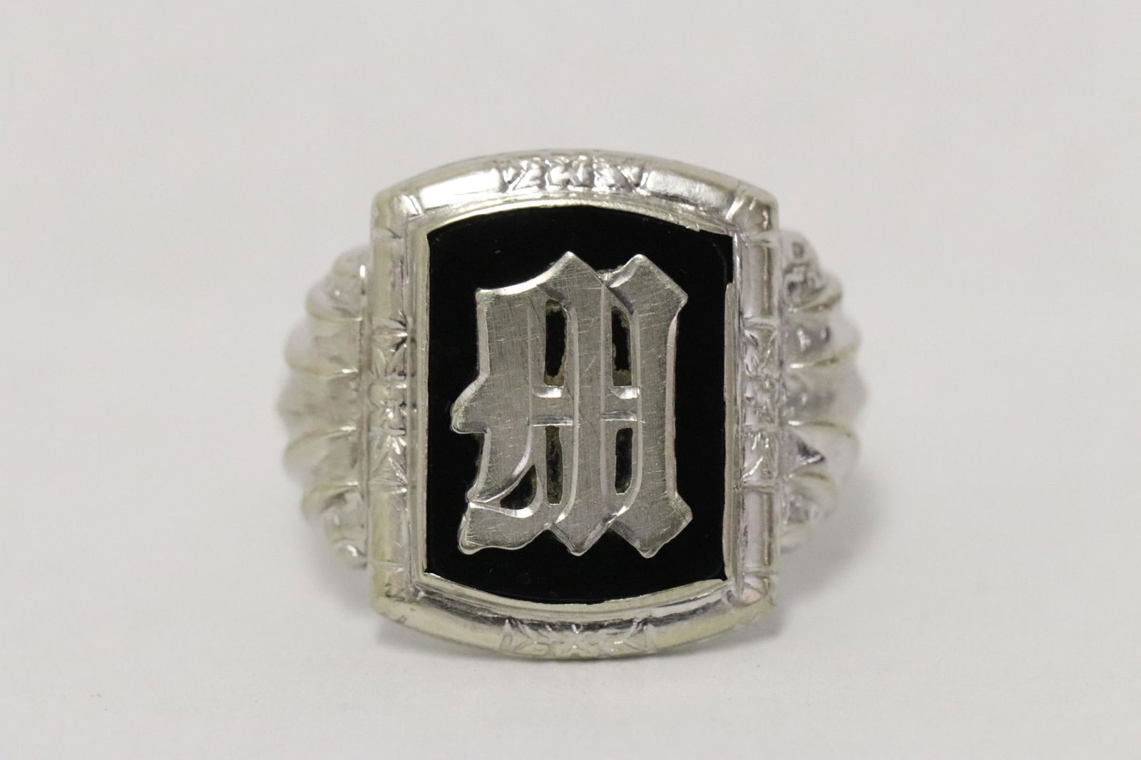 A 14k W/G ring with insignia (1 of 9)