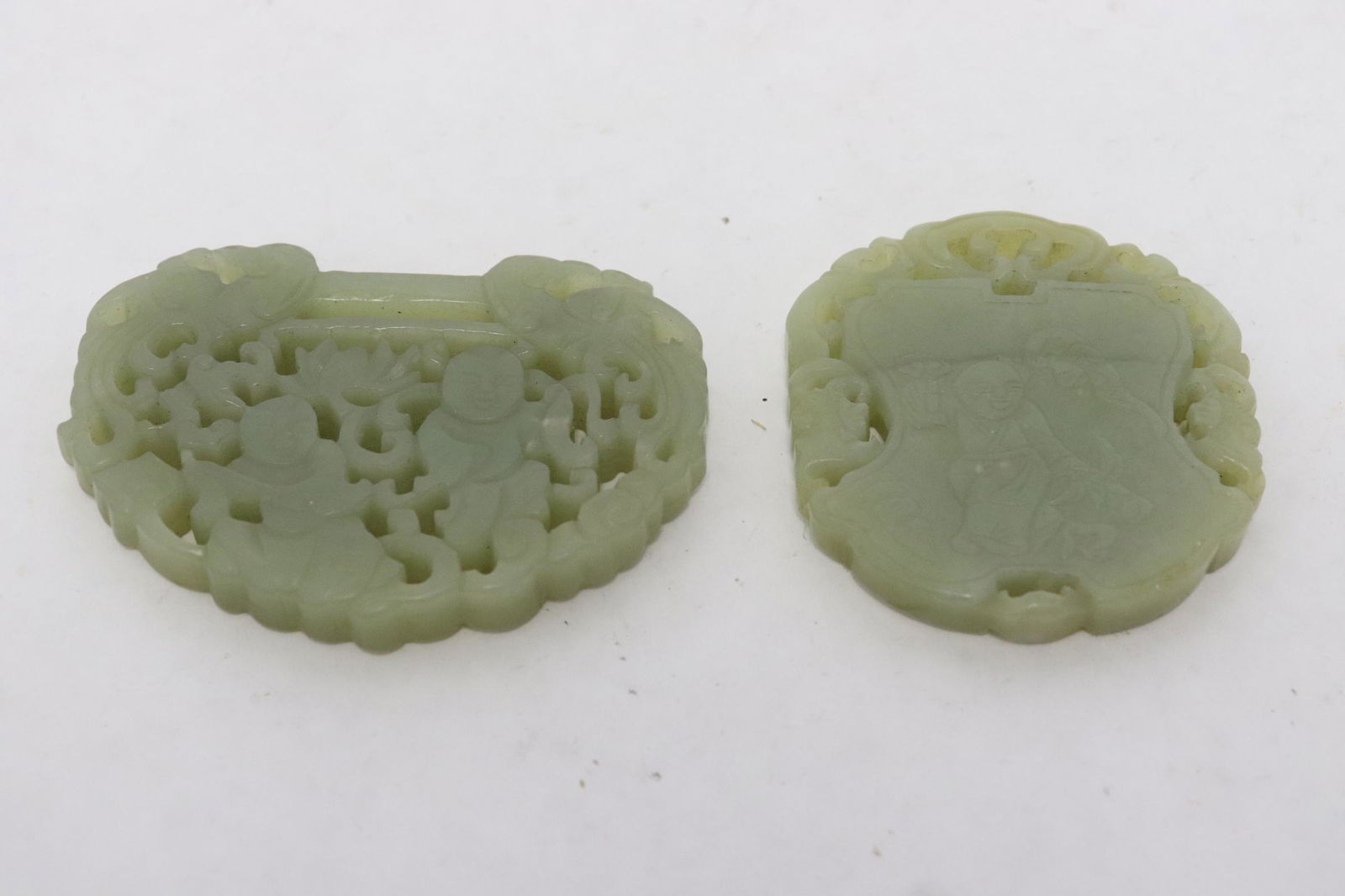 2 Chinese celadon jade carved ornaments: 2 Chinese celadon jade carved ornaments, 0.3"x2.1"x1.9", 0.3"x1.9"x2.6"