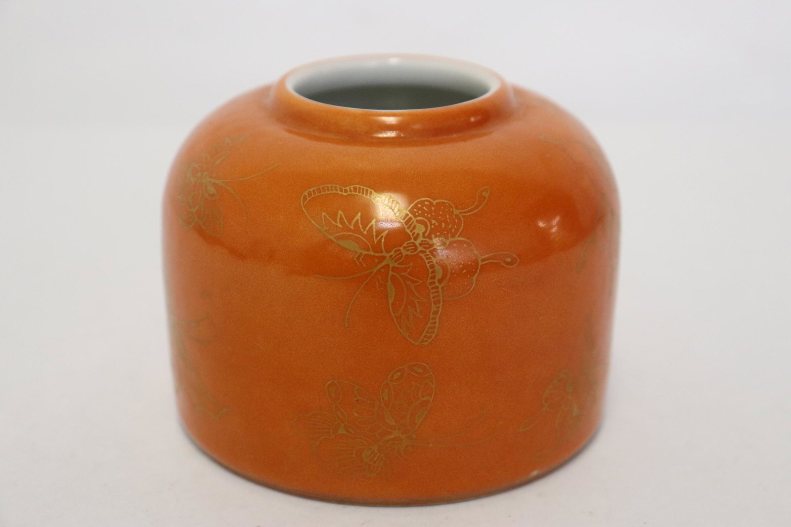 Chinese gold on orange porcelain water dripper: Chinese gold on orange porcelain water dripper, 2.7"x3.5"dia