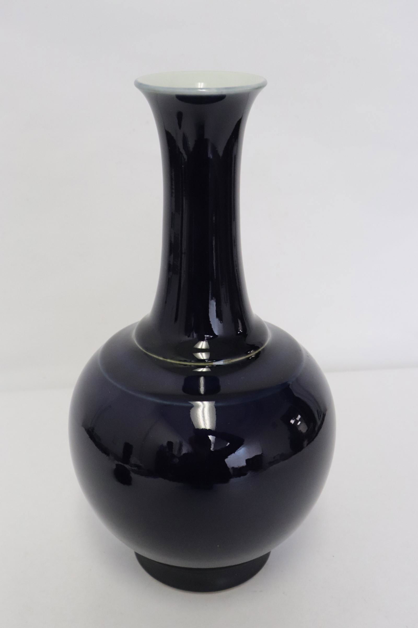 A black glazed porcelain bottle vase (1 of 10)