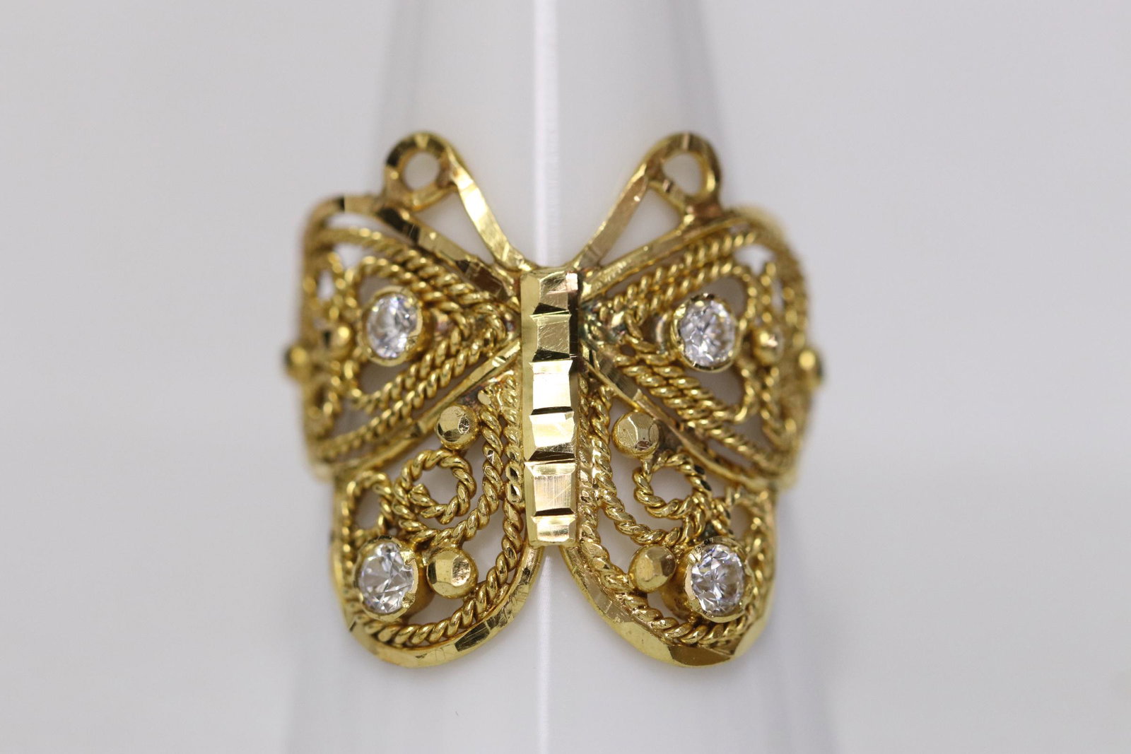 A 22K Y/G butterfly motif ring (1 of 10)