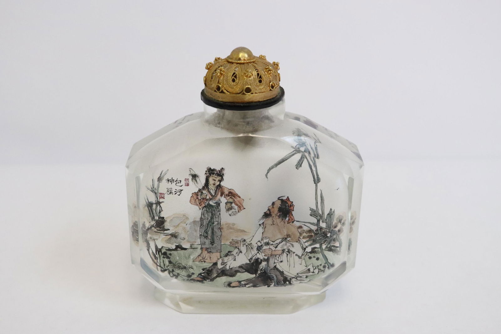 A reverse painted crystal snuff bottle, signed (1 of 9)
