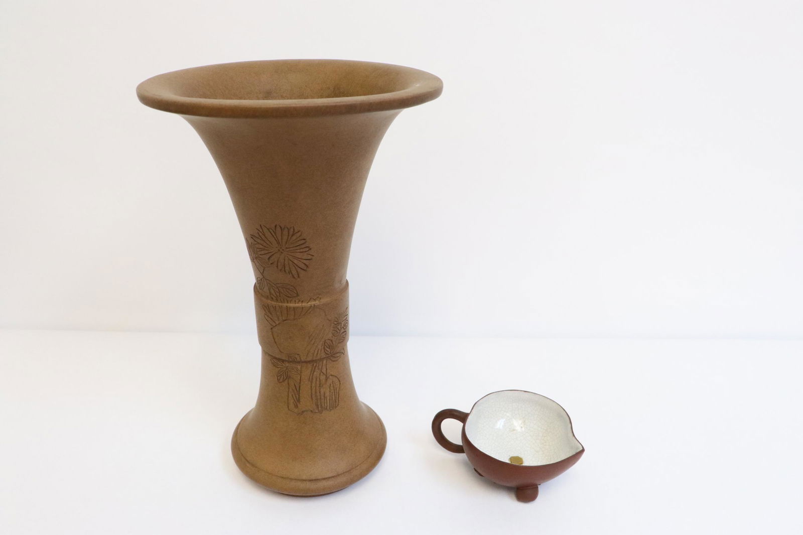 A Yixing trumpet vase (signed), & a Yixing tea cup: A Yixing trumpet vase (signed) (9.8"x6.24"dia), and a Yixing tea cup (1.5"x4"x3")