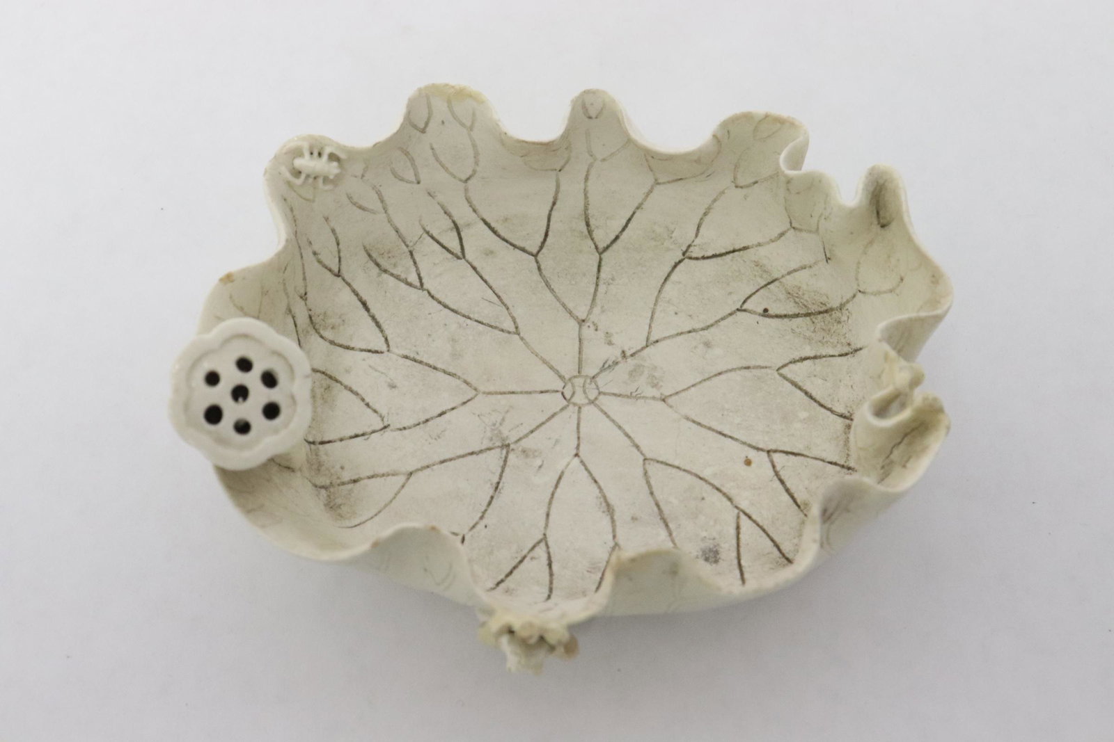 Chinese 18th/19th c. blanc de shin brush wash: An important Chinese 18th/19th century blanc de shin (å¾·åŒ–çª¯) brush wash in the form of lotus flower, ver minor flea bite on top edge, 1.65"x3.9"x3"