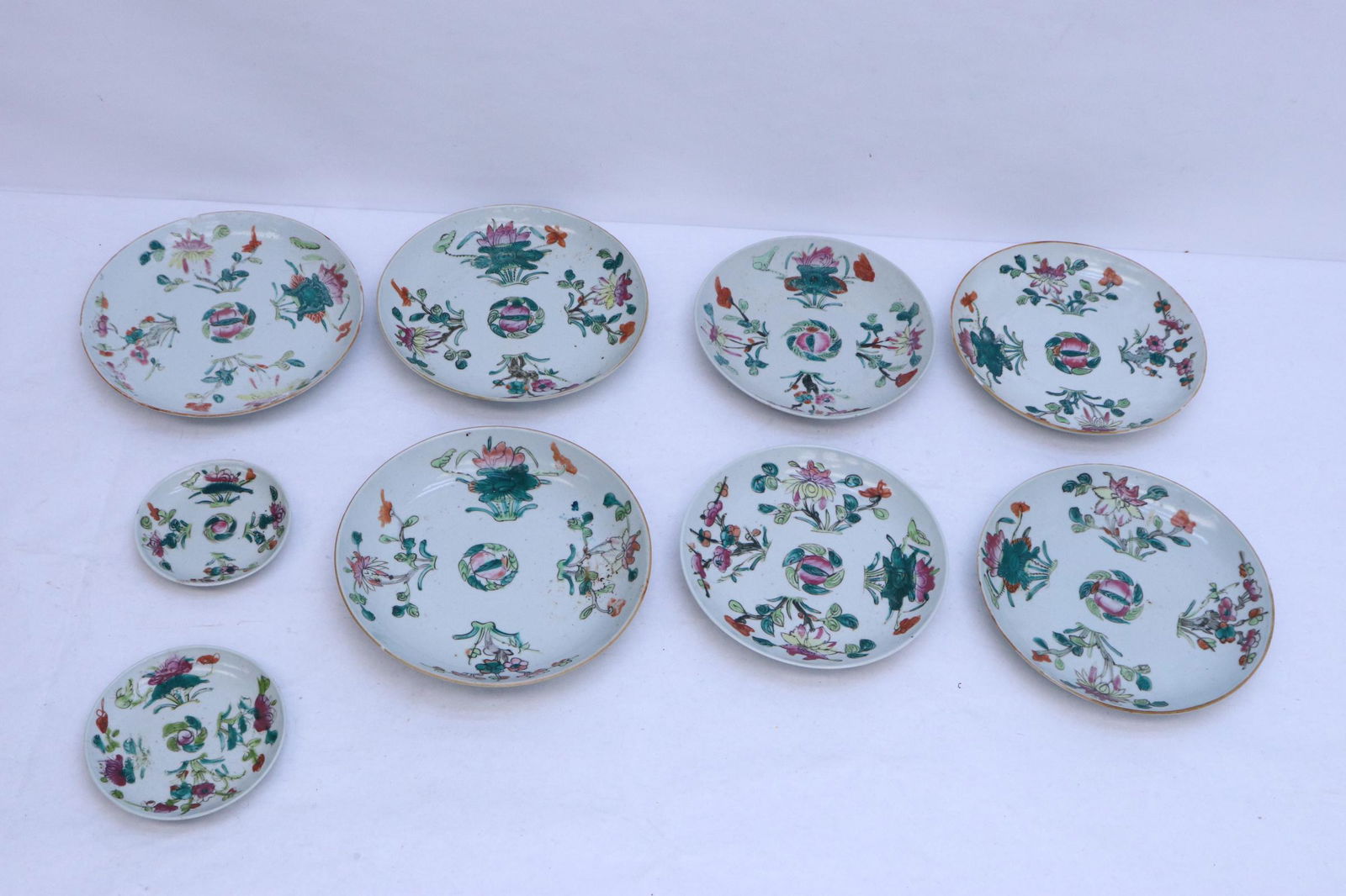 9 Chinese antique famille rose porcelain plates: 9 Chinese antique famille rose porcelain plates, chips, 0.75"x4.62"dia - 1.7"x9.1"dia