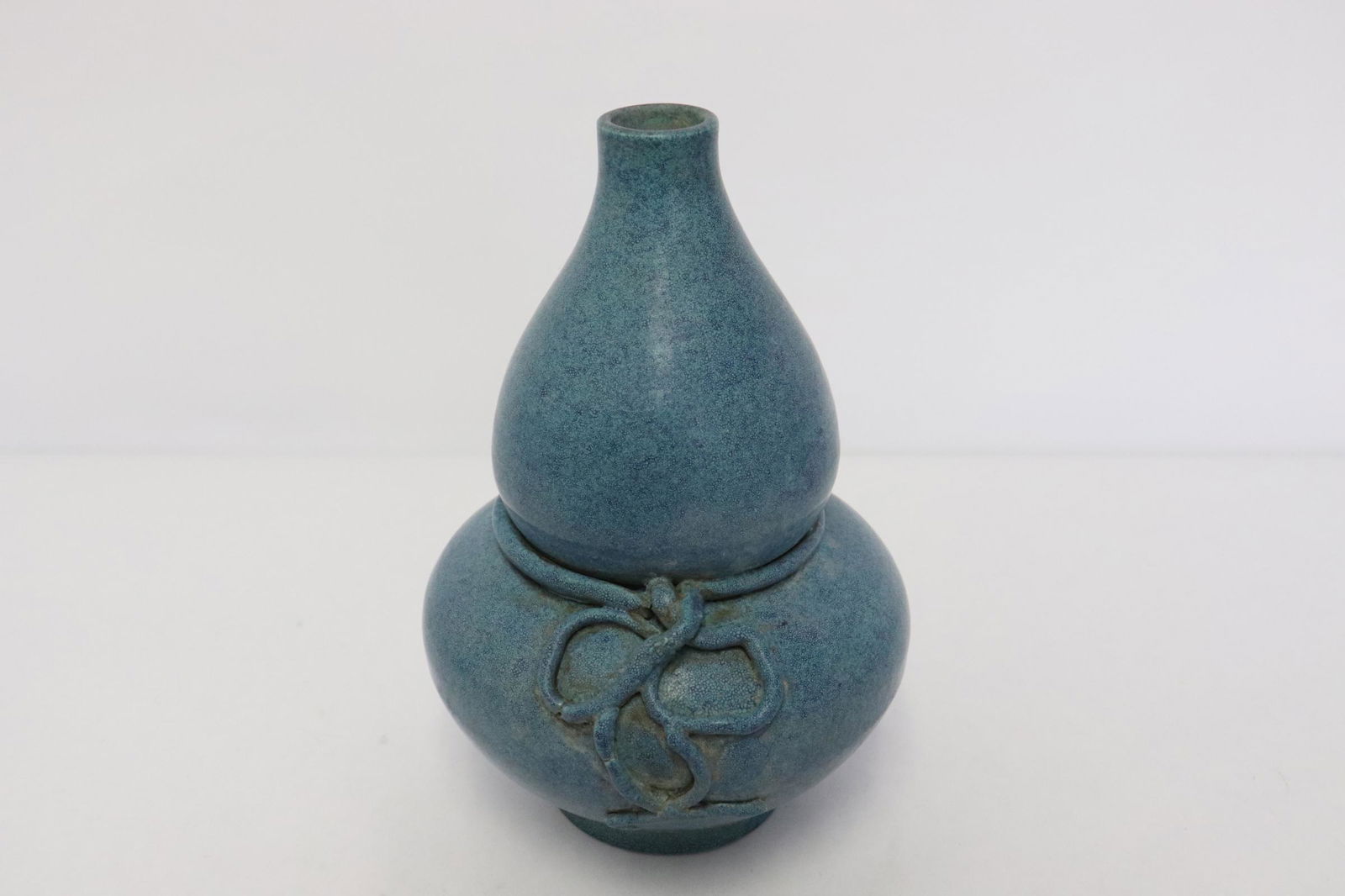 A blue glazed gourd shape porcelain vase (1 of 10)