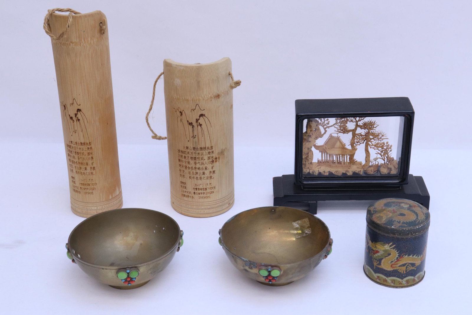 6 missc. items: 2 bamboo water jar with calligraph (8.7"x3.5"dia, 11.15"x2.76"dia), 2 brass bowl with stones (2.25"x5.2"dia), a cork art (2.95"x8.25"x2.6"), and a tea caddy with dragon (3.4"x2.8"dia)