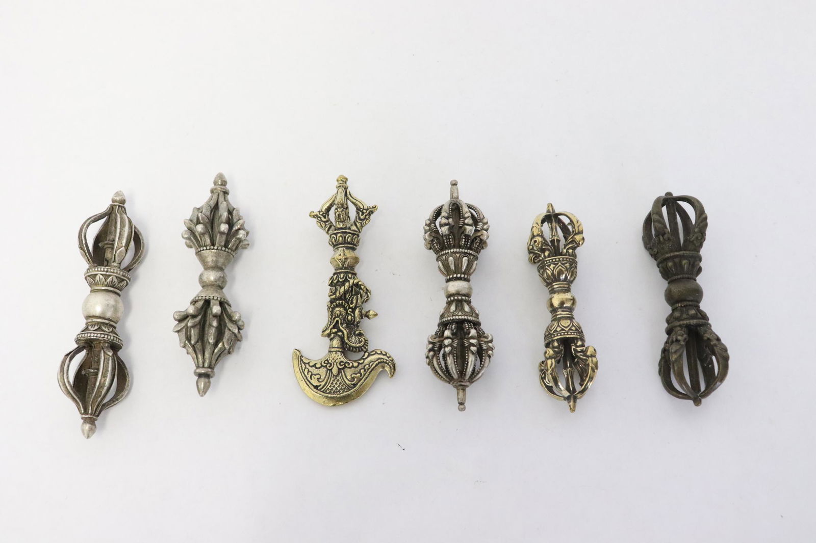 6 Tibetan bronze/ brass religious ornaments (1 of 8)