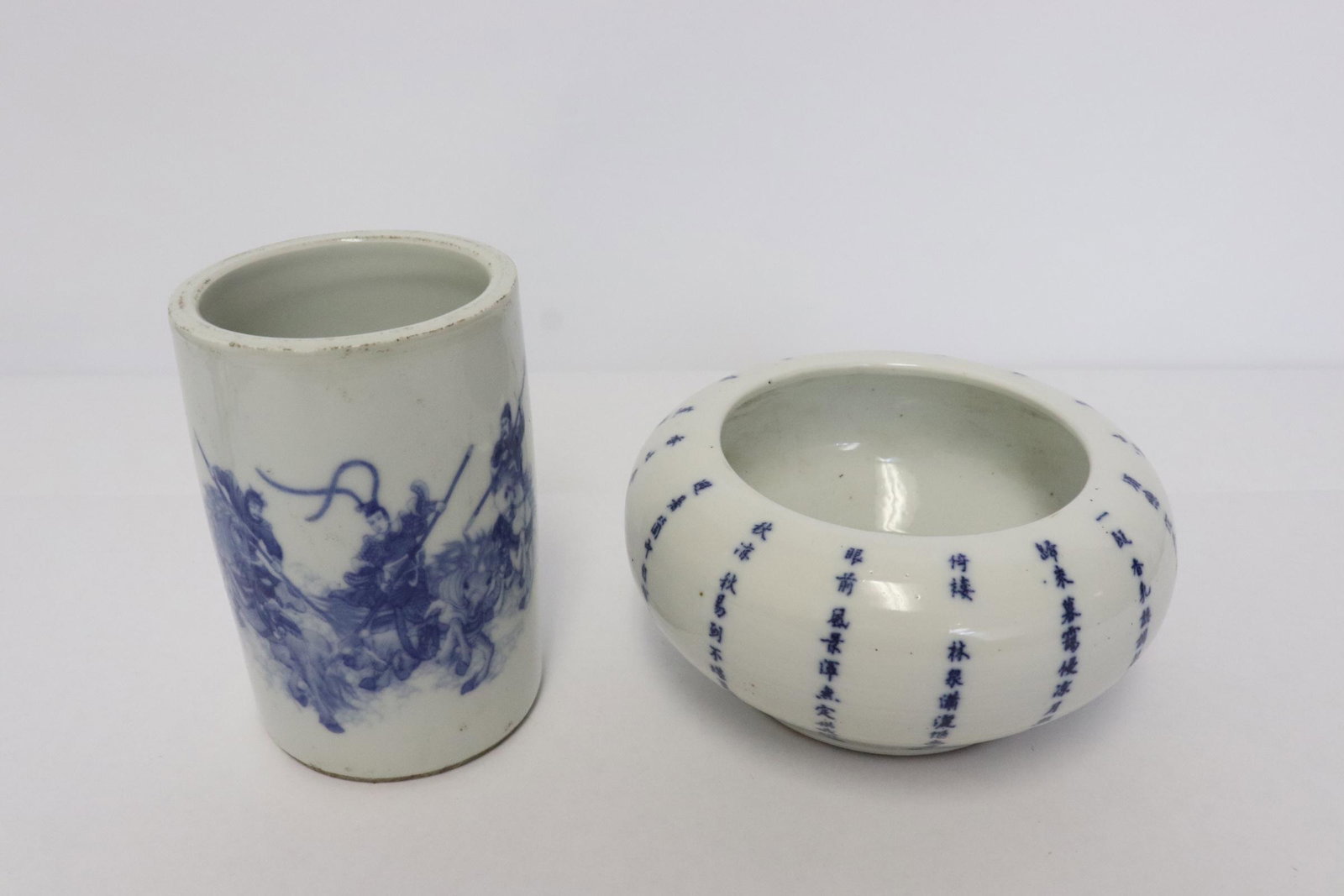 2 Chinese blue and white porcelain pieces: 2 pieces; Chinese blue and white porcelain brush holder (4.75"x3.2"dia), and Chinese blue and white water dripper (2.8"x5.9"dia)