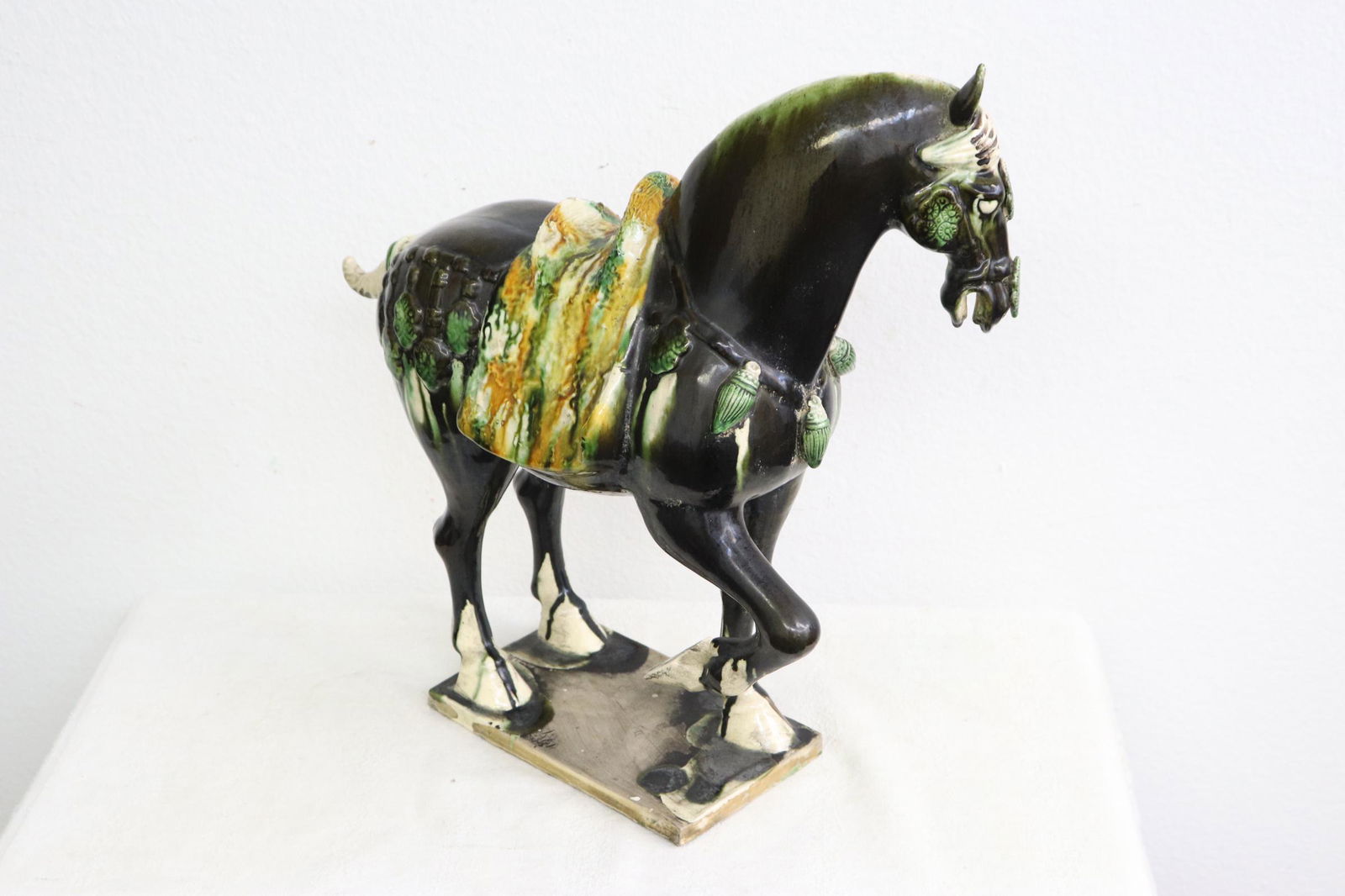 A sancai earthenware horse: A sancai earthenware horse, 15.6"H