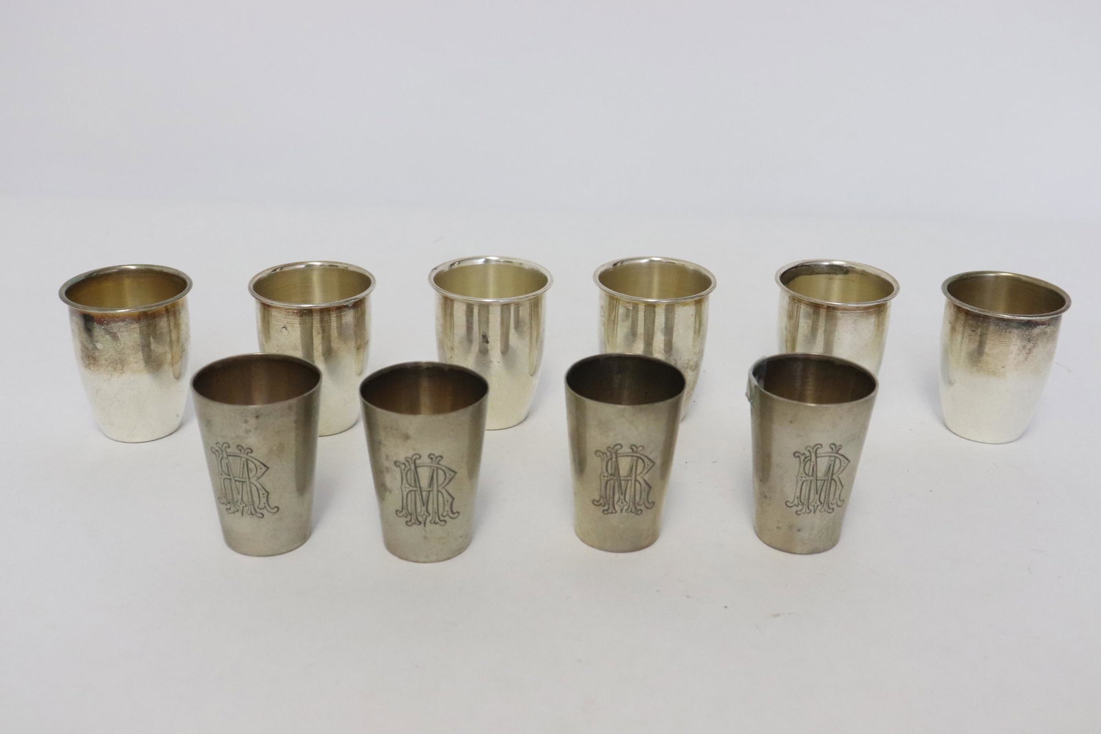 10 continental silver wine cups: 10 continental silver wine cups, wt. 143gm, 1.7"x1.25"dia - 1.7"x1.4"dia
