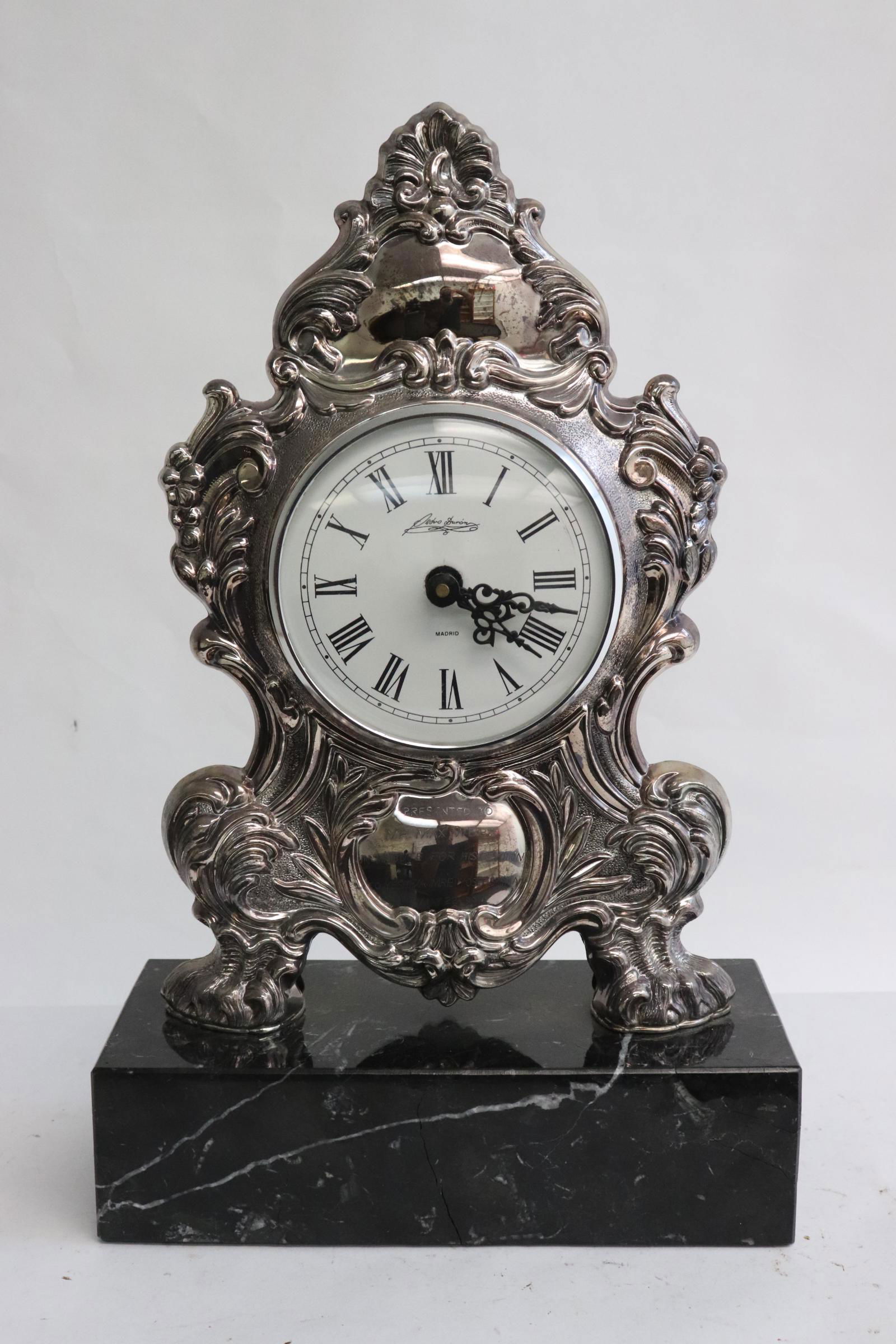 A very ornate sterling cased table clock (1 of 10)