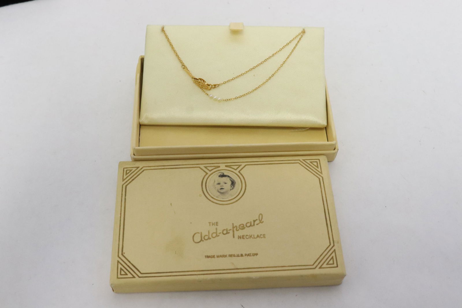 Add a pearl deals necklace for baby