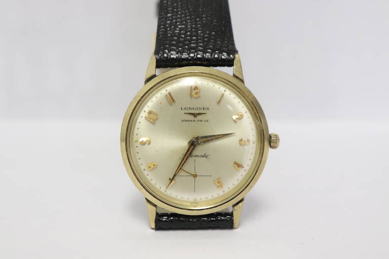 A Longines Man's Grand Prize Automatic Wrist Watch