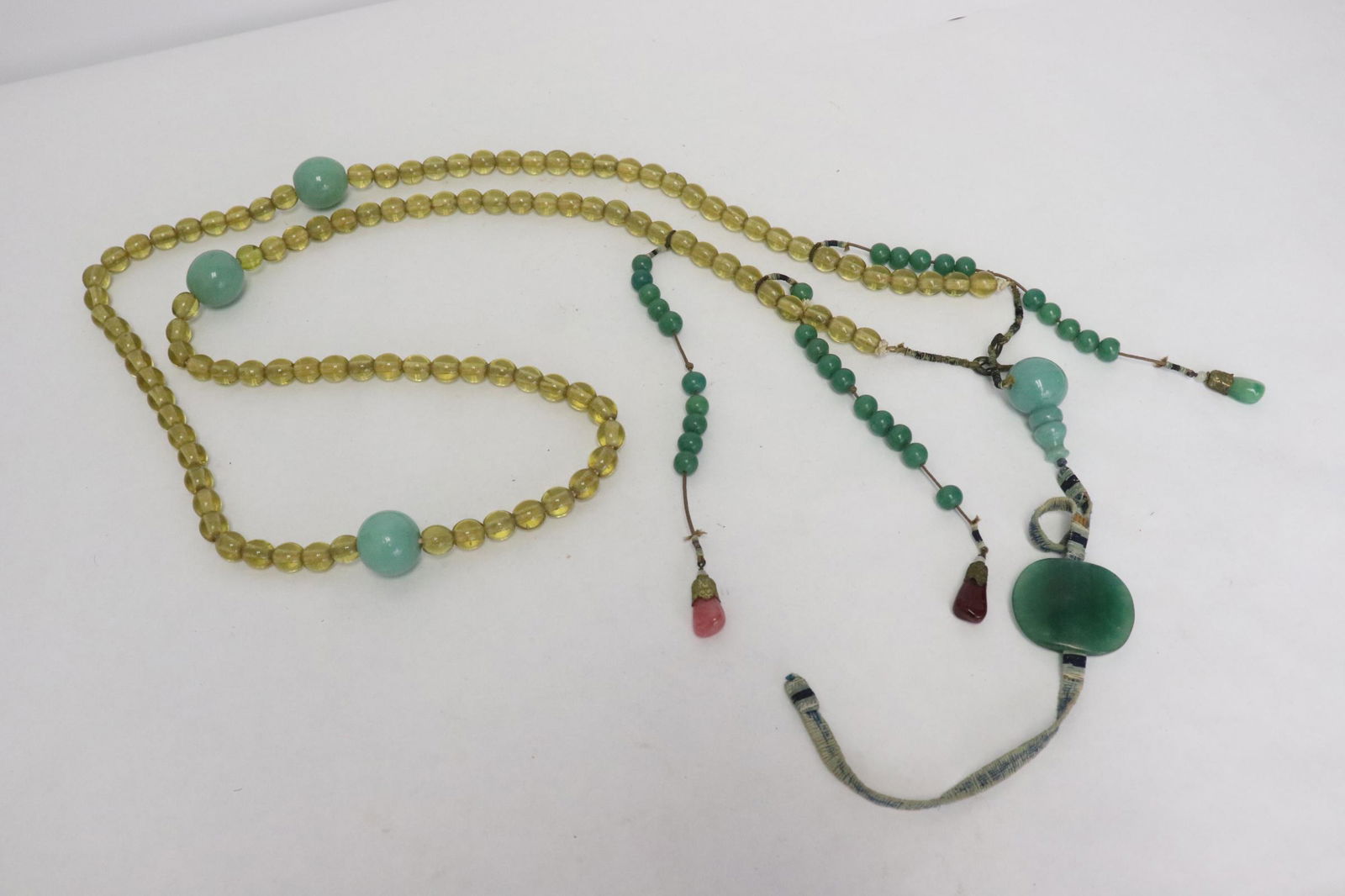 A long necklace with various beads (1 of 9)